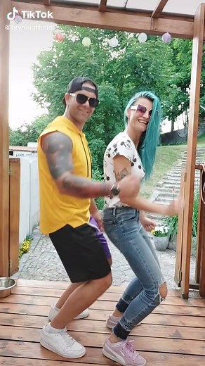 Coordinated Dance Routine on a Wooden Deck