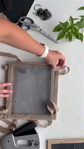 Everyone's grabbing Dollar Store frames for this genius outdoor idea!