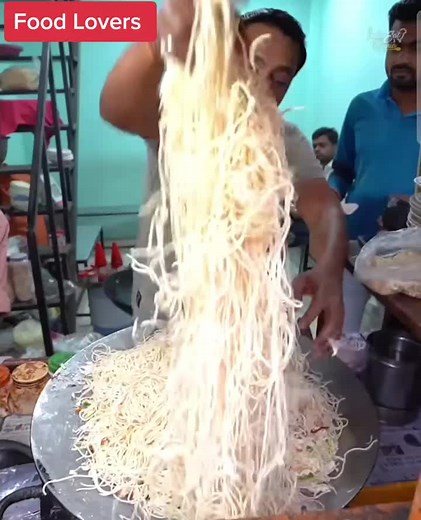 Cooking Delicious Noodles in a Busy Kitchen