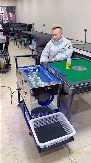 This is an automatic mahjong table, which shuffles and stacks tiles automatically