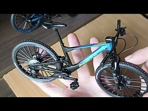 Scale model mountain bike that looks like a blue Scott Spark RC 900 Comp