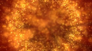Download A glowing background of orange lights and sparkles, adding warmth for free