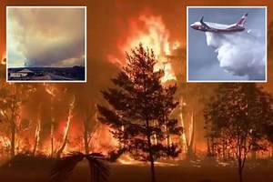 Australia 'mega fire' grows to 230-FOOT high inferno as homes destroyed
