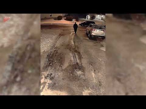 Man Falls Hard on Icy Road - 1790856