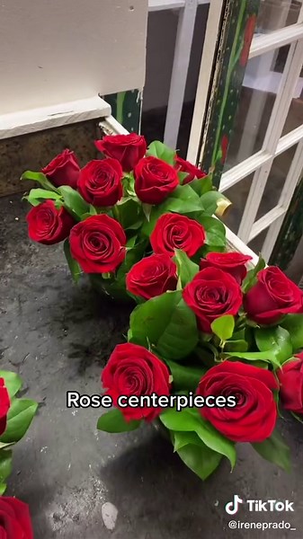Rose centerpieces ❤️ #roses #rose #centerpiece #centerpiecesideas #ideas #flowers #greenery #lemonleaves #fishbowl #fyp #work #lovewhatyoudo