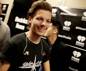 One Direction’s Louis Tomlinson shares adorable first photo of his baby boy