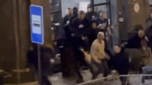 Moment Rangers fans attacked by Italian hooligans in Lisbon before Benfica tie