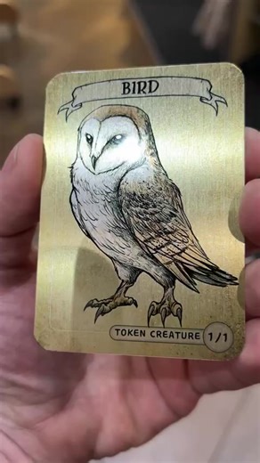 Do you know who really gives a hoot? An owl, of course! They're even kind enough to leave you a regurgitated pellet to piece together the bones of their last meal. Super cute, these nocturnal hunters can turn their heads all the way around if they want to. Let’s celebrate how awesome they are by gifting these metal cards to friends who love birds, owls, and Magic: The Gathering. Don’t let this fly away into the night—buy yours today!