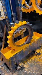 5.1K views · 10K reactions | A close-up view of a large, yellow sprocket undergoing a paint job. Heavy equipment spare parts #maintenance #repair #howto #doityourself #youcandoit #power #catpower #dieselpower #preventivemaintenance #tips #tricks #engine #mechanic visit us for your #spareparts #sparepart #oem #quality #certified #howitsdone #howitsmade #cyclonlubricants #longmarchtires #drcongo #drc #lubumbashi #kolweizi #likasi #kinshasa #congo | Fast Track Congo | Facebook