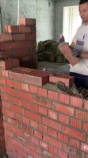 Installing red bricks beside PVC pipe corner #shorts #brick #construction