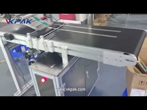 Top And Bottom Labeling Machine For Pouch With Paging Device