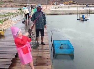 2.2M views · 14K shares | Strong Little Girl Catch A Big Fish...... | Captured Photography | Facebook