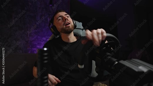 Stunned gamer reacting to sudden crash, hands raised near wheel, shocked expression, dark studio glow and tense posture