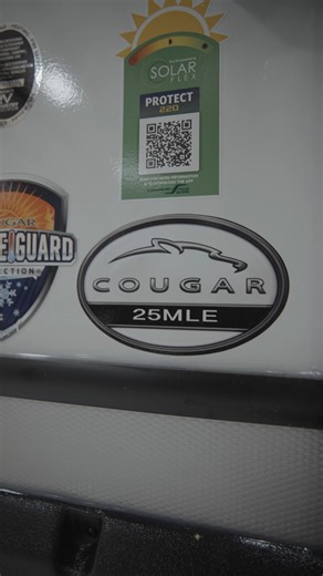 8.6K views · 47 reactions | State and National Park friendly and just over 6500 lbs, the Cougar 25MLE has loads of storage, a king-sized bed, and an outdoor kitchen! Less than 30 feet, this couples coach travel trailer is equipped with everything you need for any adventure. | Keystone RV | Facebook