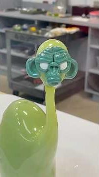 Hot Glass Team creates a dinosaur with one of Daniel Coyle’s signature monkey heads 🦕🐵 #glassart