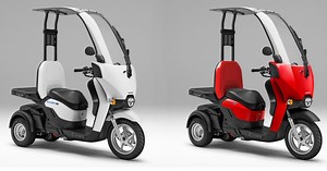 Honda's latest electric motorbike is a three-wheeled e-scooter with a roof