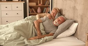 clip-3465344719-happy-senior-couple-lying-bed