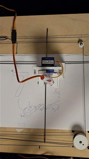 Drawing robot creating a drawing of my mother.