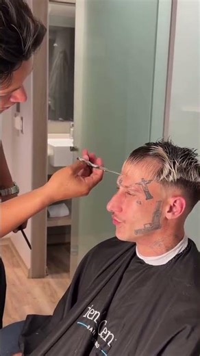 Yung Beef getting a haircut at the barber