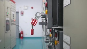 clip-1036037915-engineer-use-key-lock-out-tag-loto