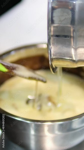 chocolate fondant making process. Step by step mixing ingredients close up Cooking chocolate fondant, pouring into molds, process