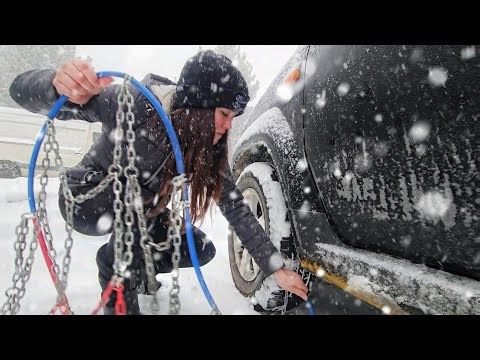 crazy snowstorm car camping in parking lot
