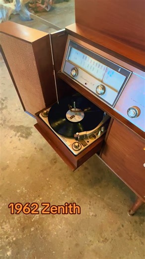 🎶 1962 Zenith Hi-Fidelity Console 🎶 When music was furniture… and furniture had soul. ✨ Fun facts: • Built in 1962, when sound systems were handcrafted to last generations • Solid wood cabinet with mid-century modern legs (aka the golden era of cool) • Features a built-in record changer, AM/FM radio, and rich stereo speakers • Zenith was famous for “quality goes in before the name goes on” • Designed to be the centerpiece of the living room, not hidden in a corner This beauty isn’t just a ster
