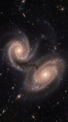 Oksana Korda | Astro Art & Science on Instagram: "DEFORMATION Interacting galaxies are reshaped primarily by tidal forces, not by direct stellar collisions. As two massive systems pass through each other, their mutual gravity stretches stellar disks, pulls out long tidal tails, and redistributes gas on galactic scales. These encounters compress interstellar gas, often triggering intense bursts of star formation while simultaneously disturbing pre-existing stellar orbits. Over time, angular momen