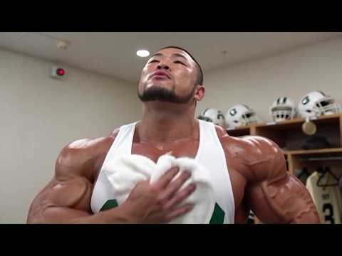American football players relaxing in the locker room after practice