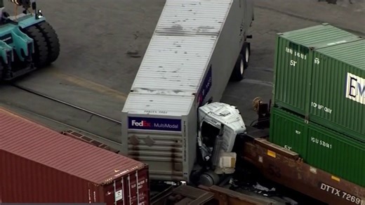 1 dead after freight train strikes semi truck on railyard tracks in Chicago: CFD