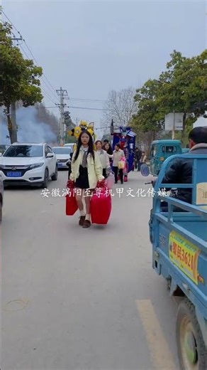 The handsome boy is getting his pigtails cut. His mother hired two robots to pick up his grandma