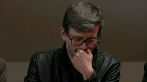 'Charlie Hebdo' cartoonist tears up during statement