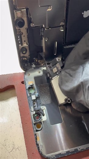 Smartphone Repair Process: Disassembling a Black Device