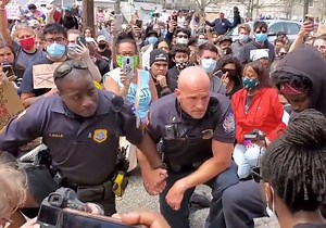 Police officers in Ocean City, N.J. took a knee and joined protesters in a moment of silence. At least 1,000 people marched in Tuesday afternoon’s peaceful protest. http://nj-ne.ws/DM9Ox3T | NJ.com