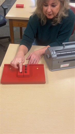 2K views · 50 reactions | With January being Braille Literacy Month, we asked Indiana School for the Blind & Visually Impaired braille teacher Heather Holland to explain the braille cell and how it translates over to the braillewriter. Watch this video to learn more. [Video Description: Heather Holland is seen sitting at a desk as she uses a braille swing cell device and a braillewriter to explain the braille cell.] | Indiana Blind Children's Foundation | Facebook