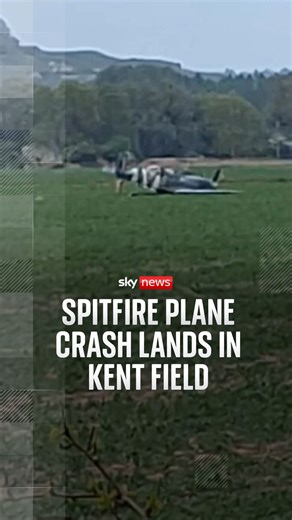 This video captures the moments after a Spitfire plane crash landed in a field in West Hythe, Kent | Sky News