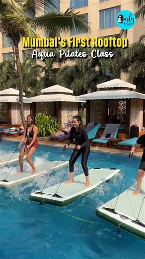 #CTDiscovery Mumbai’s First Rooftop Aqua Pilates Class Splashed into Mumbai’s first Aqua Pilates class with 20 strangers and left feeling like part of a full-blown wellness fam From Pilates, Yoga, and Tidal Toning in the water to fun games, detox sips, DIY flower bouquets, and photo ops, this Sunday morning was all kinds of refreshing. Proof that Mumbai’s fitness and wellness scene is not just growing, it’s thriving ✨ #AquaPilatesMumbai #WellnessCommunity #SundayWellSpent #FitnessFun | Curly Tal