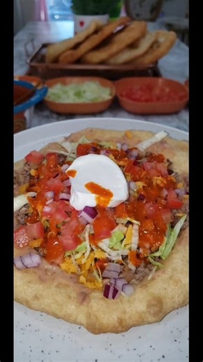 Tender and fluffy Navajo fry bread! As far as I know, this is the best ever! It tastes great with all its fixings or you can have it with honey or powdered sugar. The Navajo put ground beef, chiles, cheese, onion, lettuce, and beans on them and call them Navajo tacos. However you make them or call them they are simply delicious #frybread#frybreadrecipes#frybreadrecipe | Melissa Cruz