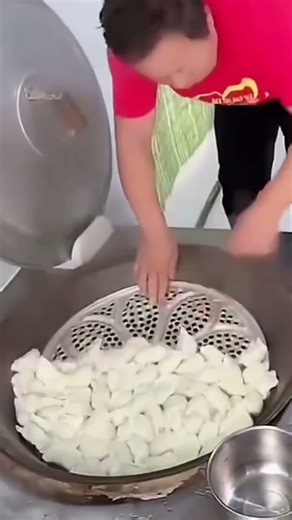 A food that is being steamed and given a net to cook evenly