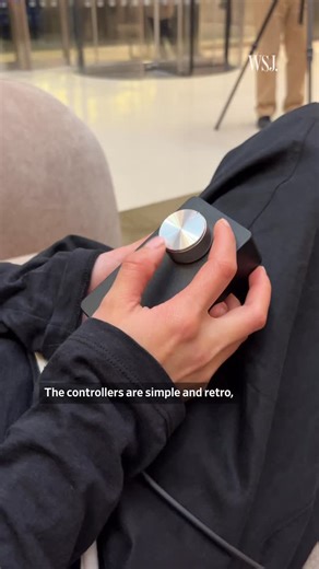 WSJ. Magazine on Instagram: "Game on. This week an artist turned the lobby ceiling of a New York skyscraper into a gigantic version of the videogame Pong that anyone can play. Walk into One Liberty Plaza in the city’s Financial District and look up: Suspended nearly 32 feet high along the ceiling is “A::Light (Atari Light),” a grid of 144 square white lights that at first glance give off an ordinary office-light glow. But each square is actually connected to a hidden computer console along with 