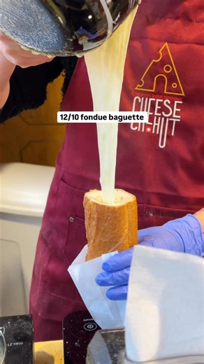 Danny & Leigh Anne Mayberry | Adventure Travel Couple on Instagram: "This might have been the best thing we ate all Christmas market season… and that’s saying a lot. 🧀🥖 At the Montreux Christmas Market, we found a warm, gooey fondue baguette from @swiss_cheese_hut , and honestly? We’re still thinking about it. Perfectly crusty bread, rich melted cheese, and exactly what you want to be eating while wandering a Christmas market by the lake. If you’re visiting Montreux, do not miss this spot. One