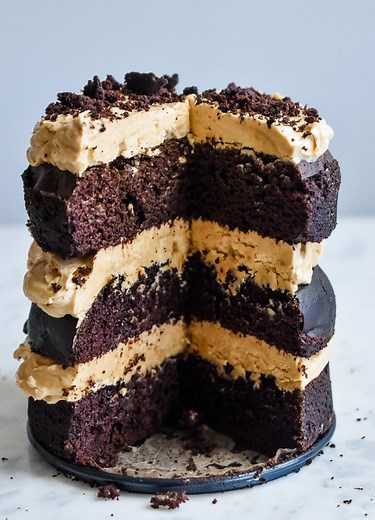 Mini Layered Chocolate Cake with Peanut Butter Frosting. Message for recipe. #chocolatecakerecipe #chocolatecake #peanutbutter #desserts #homebaking #chocolateheaven