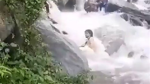 Horror moment tourist is swept away & dragged to his death over waterfall