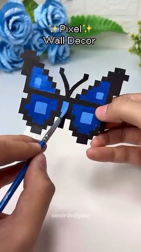 244K views · 40K reactions | DIY Pixel Butterfly Wall Decor 曆 Cute, retro pixel vibes for your room! Easy, budget-friendly & perfect for aesthetic décor lovers. ✨ #pixelart #pixelbutterfly #PixelButterfly #AestheticVibes #diy #aestheticdiy #walldecor #PaperCrafts #omairdesigner | Omair Designer | Facebook