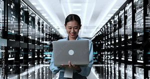 Asian Woman Working On A Laptop In Server Room Database. Performing Backups Network Operations With Rack Servers In Digital High Tech Room