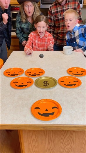 77K views · 307 reactions | Halloween Pumpkin Plate Party Game  Dad, mom, and the whole family play funny halloween ball bounce party game for fun prizes like candy. Whoever bounces the ping pong bal on the golden plate, wins a special prize better than all the rest  This video was produced by Network Media and Benson Bros | The Scene Machine | Facebook