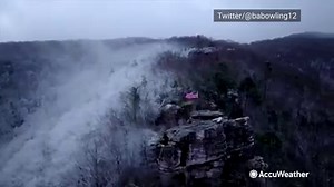 An American flag can be seen blowing in the wind atop Flag Rock in Norton, Virginia, yesterday. https://bit.ly/37s6znB | AccuWeather