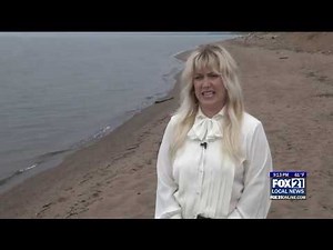 Duluth woman raises questions about Minnesota laws by going topless at the beach