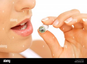 Once ingested, the endoscopic video capsule, equiped with a camera, allows the complete exploration in the small intestine Stock Photo - Alamy