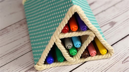 Triangle pencil organizer made out of cardboard